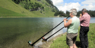 Wonderful echoes from two carbon alphorns as they float in the water, with Rolf, Seealpsee, Canton Appenzell, Switzerland
